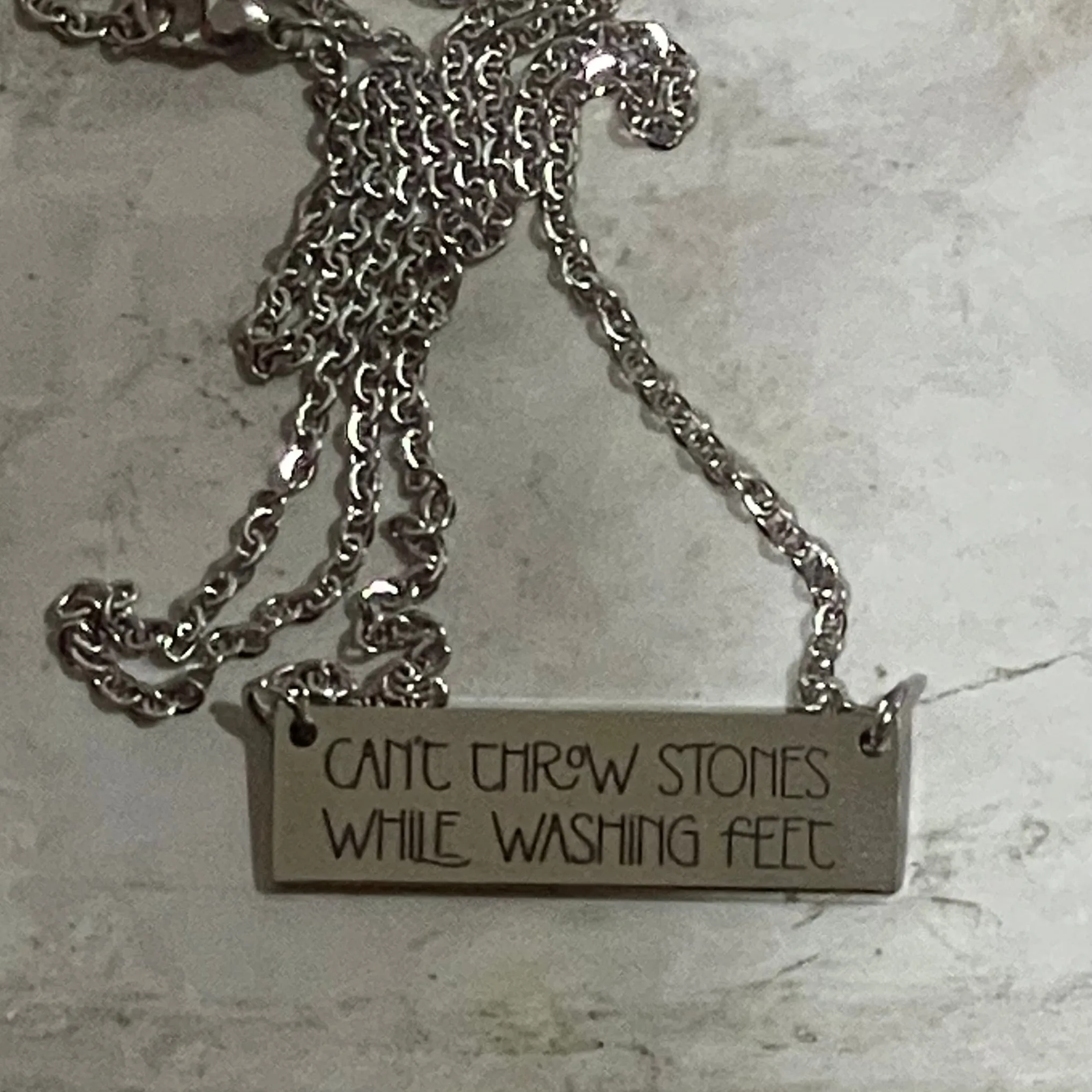 "Golden Wisdom: The 'Can't Throw Stones While Washing Feet' 18" Silver Bar Necklace"